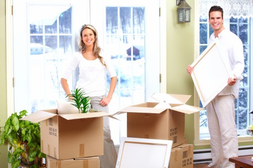 Customer and movers coordinating during a house move in Belgravia